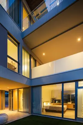 an exterior view of a house with large windows at Alky Luxury Villa in Chania Town