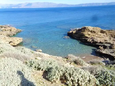 a view of the ocean from the shore at Apartment in natural stone house in Spiliá