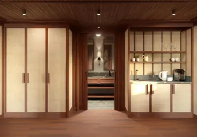 a kitchen with sliding glass doors and a counter at The Revery, Elafonisi - Member of Leading Hotels of the World in Livadia