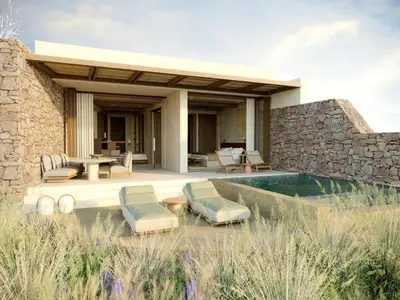 a villa with a swimming pool and a patio at The Revery, Elafonisi - Member of Leading Hotels of the World in Livadia