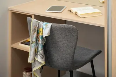 a desk with a chair and a desk with a laptop at Ethea Residences-Orino in Chania Town