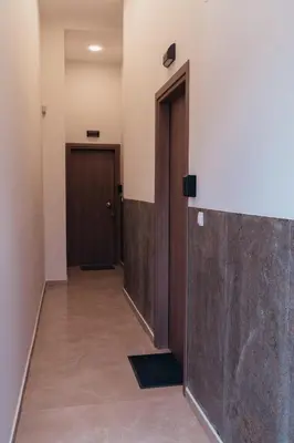 a hallway with two doors and a hallwayngth at MP Apartments in Chania Town