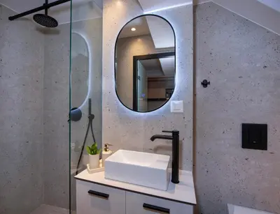 a bathroom with a sink and a mirror at Bōw Ground Floor Luxury Apt-In Chania Old Town! in Chania Town