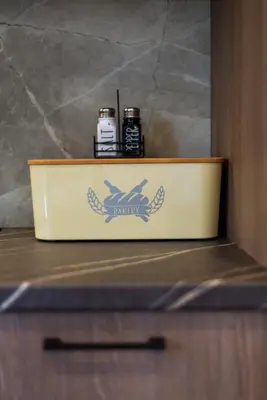 a box with a logo on it sitting on a counter at Chania Experience Residence in Chania Town