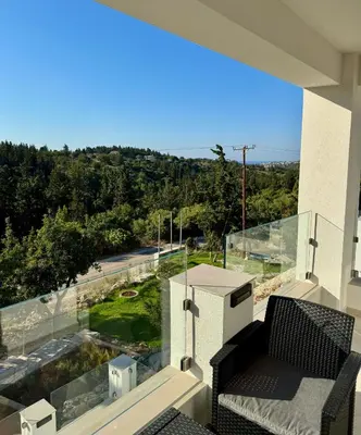a balcony with a view of the ocean at Villa & Apartament Armonia 2 Sol Aura Gavalochori - Vamos KRETA in Vamos