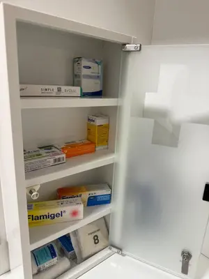 a kitchen pantry with shelves filled with food at Oneiro Apartment in Kounoupidhianá