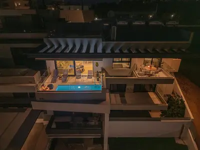 a model of a building with a swimming pool at Iris Luxury Apartment in Chania Town