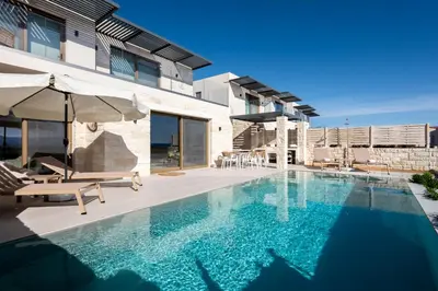 an image of a swimming pool in a house at Elpida Luxury Villa, private pool, fantastic view! in Stérnai
