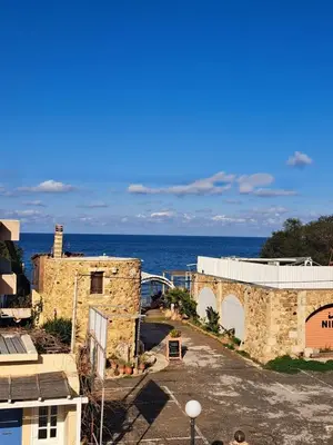 a view of the ocean from a building at SeaREN Apartment in Stalos