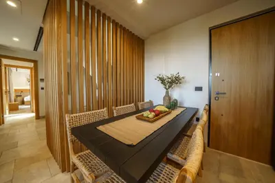 a dining room with a table and chairs at EAST VILLA by CYAMES in Gavalochori