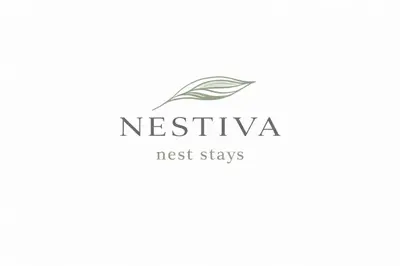 a logo for a nest stays company at NESTIVA - Apartment in the Center of Chania in Chania Town