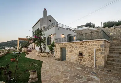 an image of a villa with a stone facade at Villa Panareti in Kolymvari