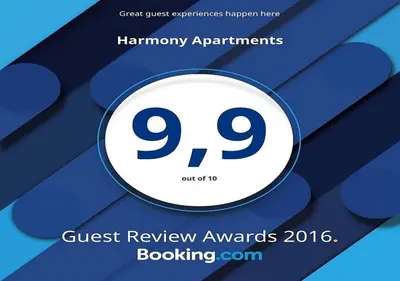a sign that reads guest review awards with a number at Harmony Apartments in Kato Daratso