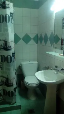 a bathroom with a toilet and a sink at Constantinos Studios in Chania Town