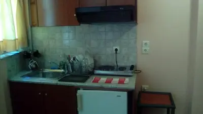 a kitchen with a sink and a counter top at Constantinos Studios in Chania Town