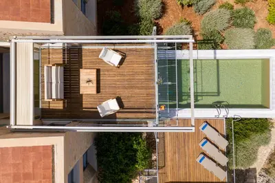 an overhead view of a building with a balcony at Kaminia Villa in Makhairoí