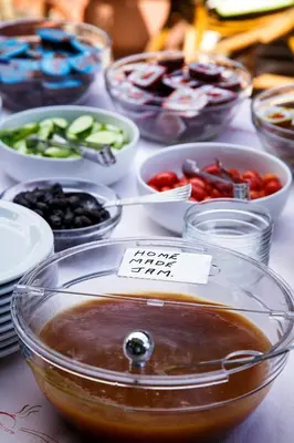 a table topped with bowls of different types of food at Hotel Ideon in Chania Town