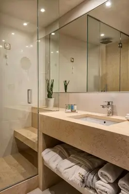 a bathroom with a sink and a mirror at Civitel Akali Hotel in Chania Town