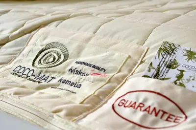 a close up of a mattress with labels on it at Casa Regina Luxury House in Chania Town