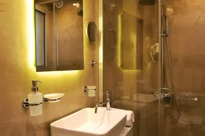 a bathroom with a sink and a shower at Elia Dorotheou in Chania Town