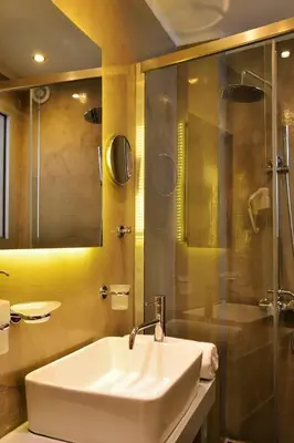 a bathroom with a sink and a shower at Elia Dorotheou in Chania Town