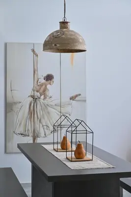a table with two bird cages with fruit on it at Villa Felenia in Vryses