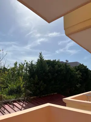 a view from the balcony of a house at Angellinas Apartments in Kato Daratso