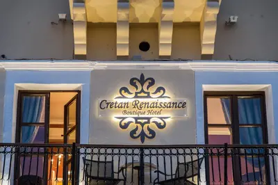 a sign for a restaurant on the side of a building at Cretan Renaissance in Chania Town