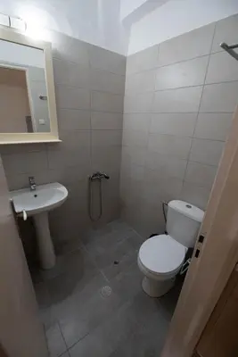 a bathroom with a toilet and a sink at Electra Studios in Gerani Chanion