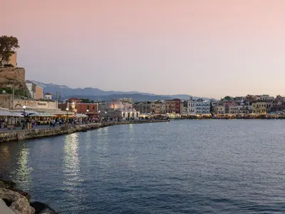 a body of water with buildings and a city at Avra City Boutique Hotel in Chania Town