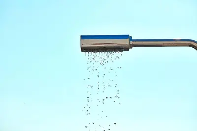a brush full of droplets of water at Elea Villas - Aspro & Blanche in Almirida
