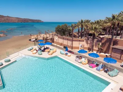 an overhead view of a swimming pool at a beach at Chrispy Beach Resort, Agia Marina in Agia Marina Nea Kydonias