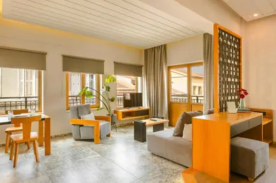 a living room with a couch and a table at Querini Luxury Suites in Chania Town
