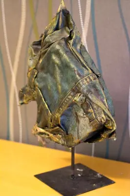 a piece of cloth on a stand on a table at City Square Apartment in Chania Town