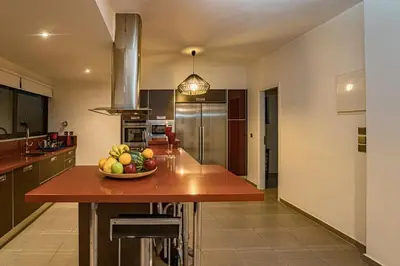 a kitchen with a bowl of fruit on a counter at Villa Detoro in Kambánion