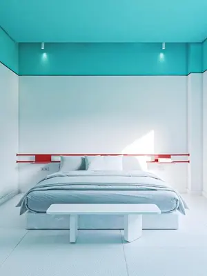 a bedroom with a bed with a blue headboard at Cocoon City Hostel in Chania Town