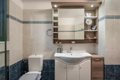a bathroom with a sink and a toilet at Vaggelio House in Chania Town