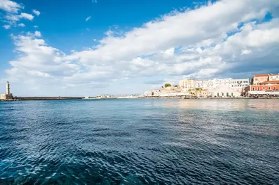 a view of a large body of water with buildings at Mare Civitas Apartments in Chania Town