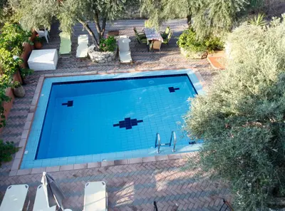 an overhead view of a swimming pool in a yard at Villa-Jasmin in Kato Daratso