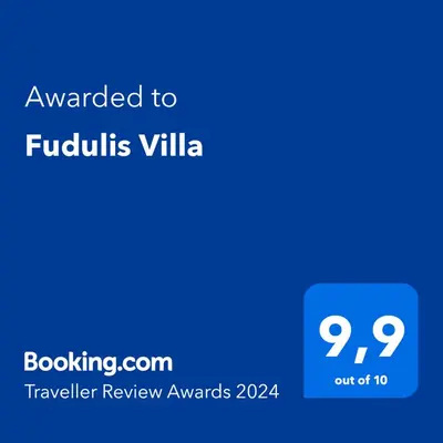 a blue text box with the words awarded to furlus villa at Fudulis Villa in Ravdhoúkha