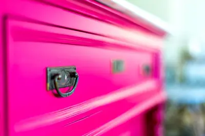 a close up of a pink door with a handle at Chryssi myHome in Kato Daratso