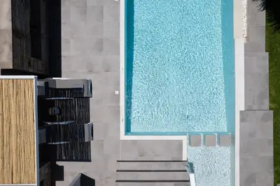 an overhead view of a swimming pool in a building at Villa Veni in Kolymvari