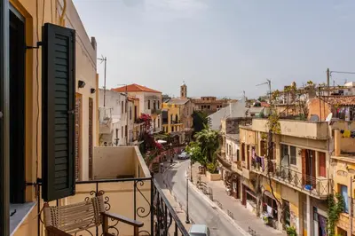 a view of a city street from a balcony at Spolia Art Maison in Chania Town