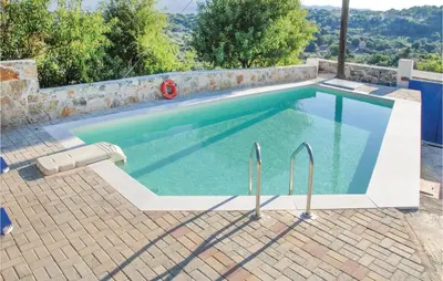 a swimming pool in a villa at Amazing Home In Malaxa, Chania in Maláxa