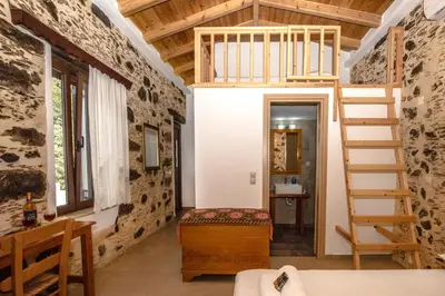a tiny house with a staircase in a room at Fairytale Elafonisi in Elafonisi