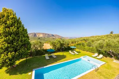 an overhead view of a swimming pool in a yard at Villa Dimitris in Vlikhádha
