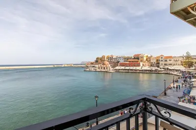 a view of a body of water with buildings at Lucia Hotel in Chania Town