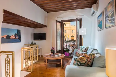 a living room with a couch and a table at Casa Irene in Chania Town
