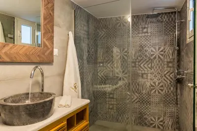 a bathroom with a sink and a shower at Casa Irene in Chania Town