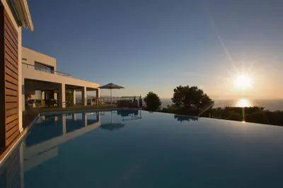 a view of a swimming pool in a house at VILLA TERRA CRETA Luxury Retreat and Spa in Chania Town